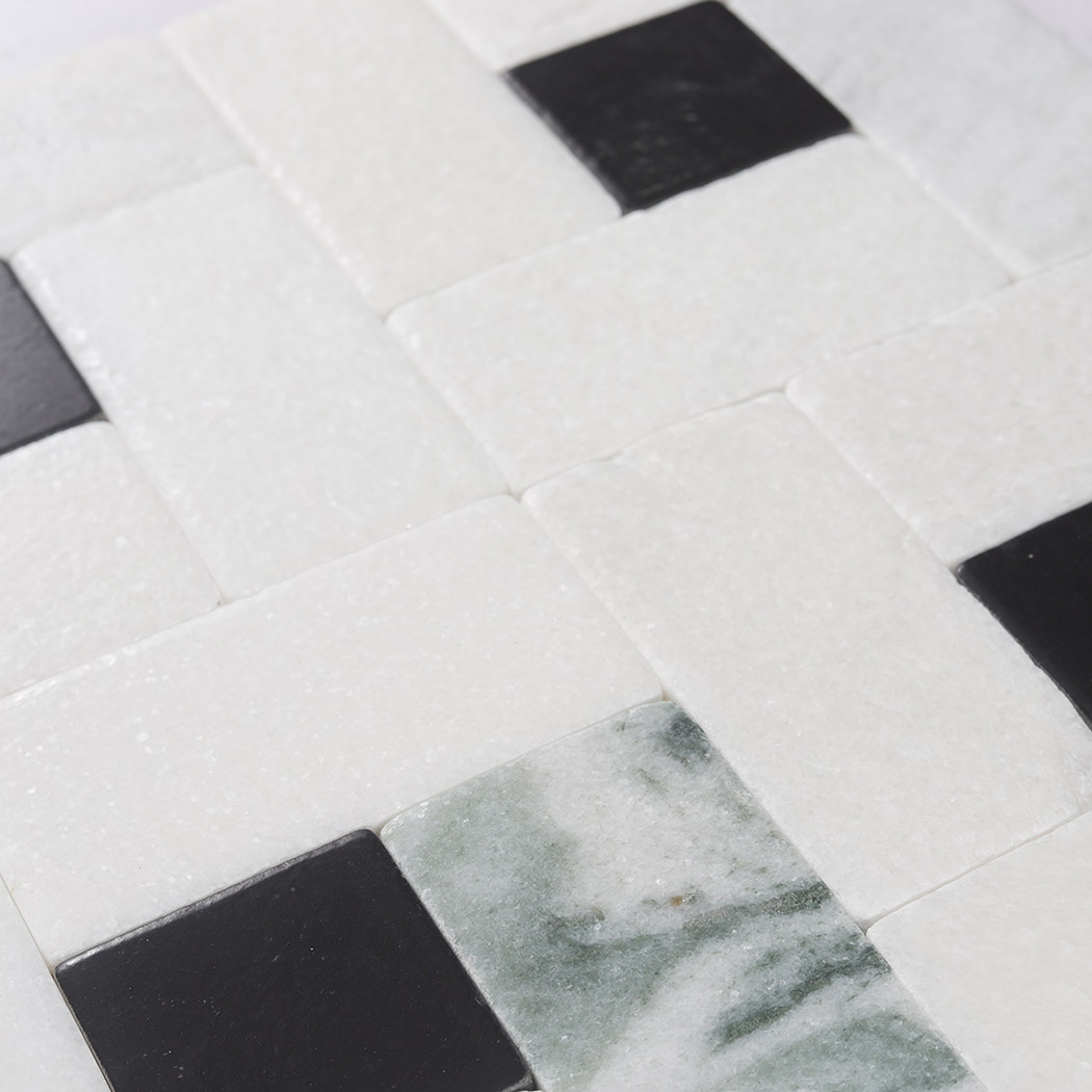 White marble geometric mosaic with black squares and green veined accents