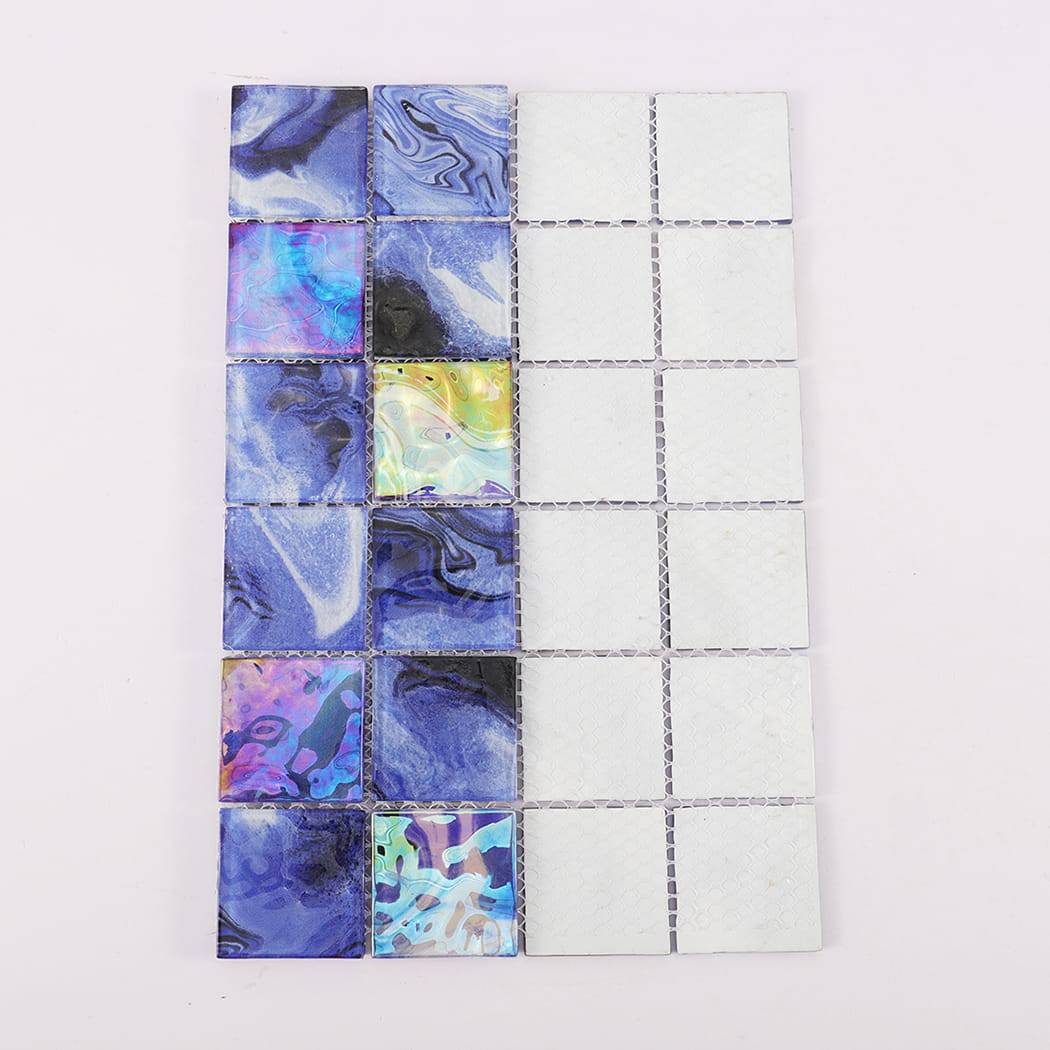 Back view of navy blue iridescent square glass mosaic tiles on mesh backing