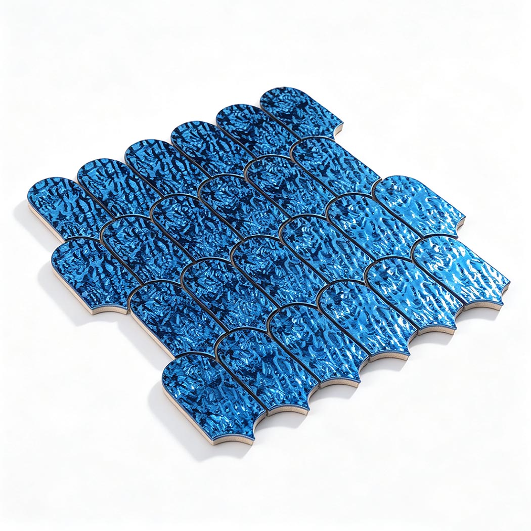 Angled view of an ocean blue ripple scallop mosaic tile sheet