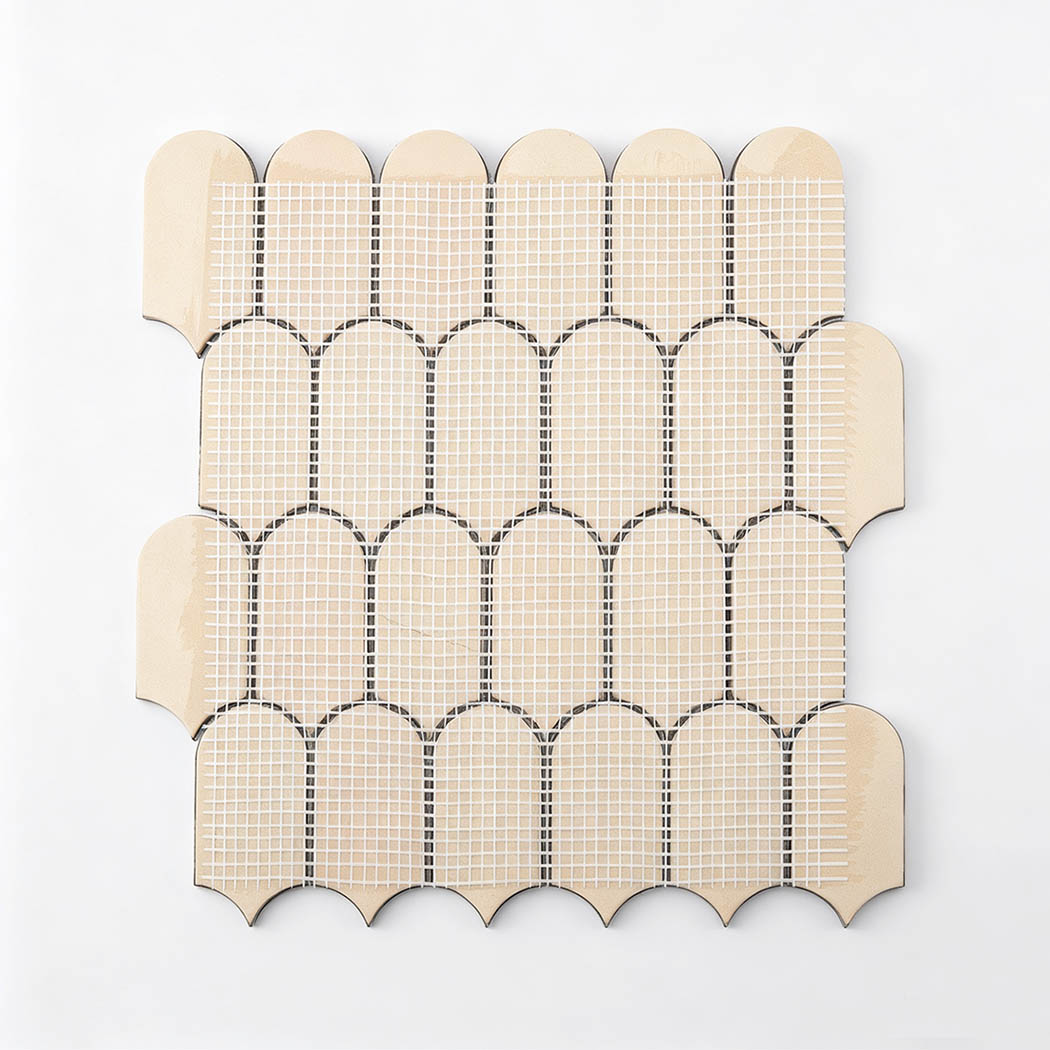 Back view of ocean blue ripple scallop mosaic tile sheet with mesh backing