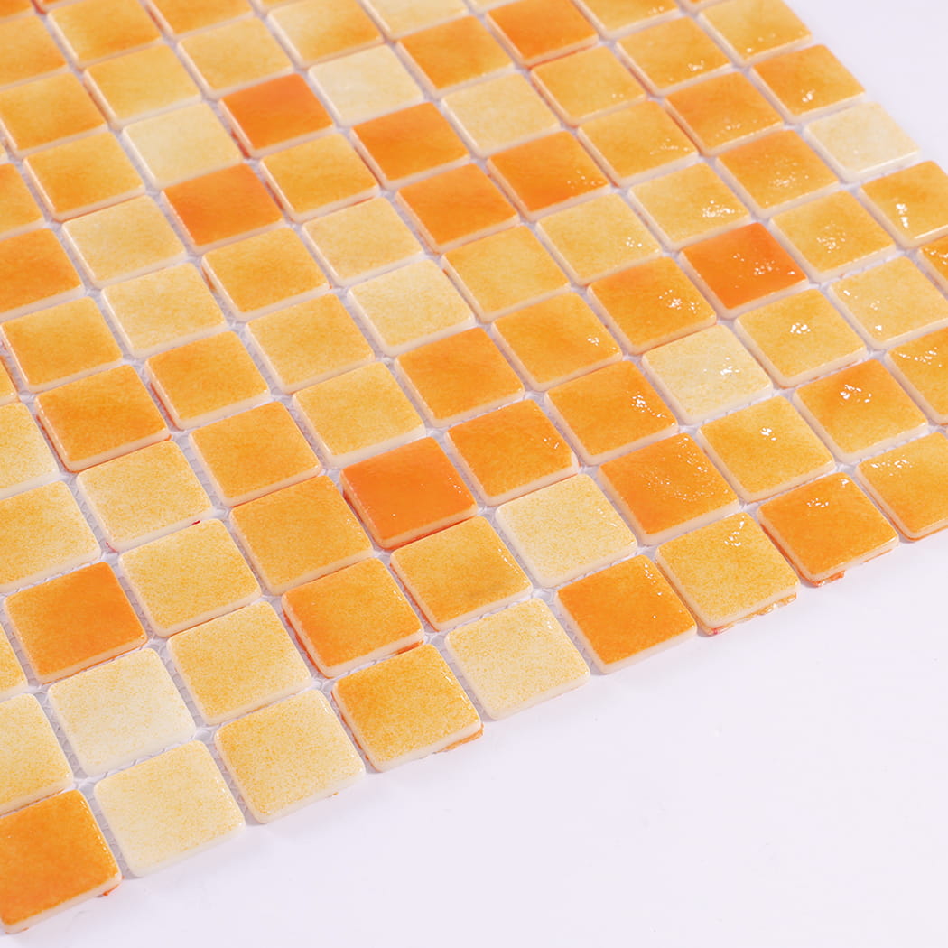 Side view of orange recycled glass mosaic tiles showing tile thickness