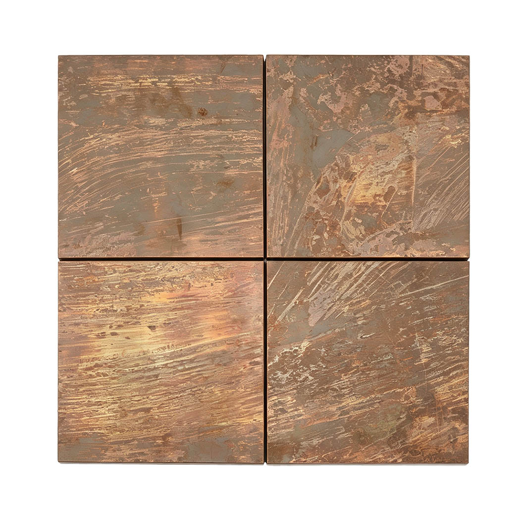Four oxidized copper square tiles with varied bronze and brown surface patterns
