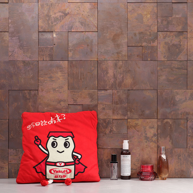 Oxidized copper metal wall tiles in mixed rectangle and square shapes
