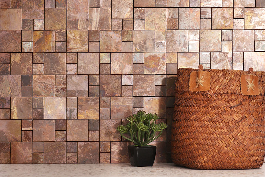 Oxidized red copper mosaic wall tile with warm rustic texture
