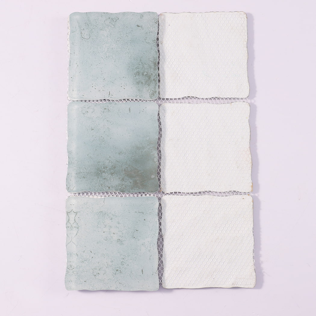 Back view of pale aqua wavy square glass mosaic tiles with mesh backing