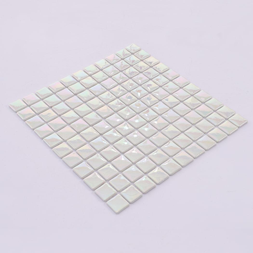 Angled view of pearl white recycled glass square mosaic tile sheet