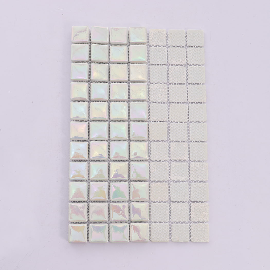 Backside view of pearl white recycled glass mosaic tile sheet with mesh backing