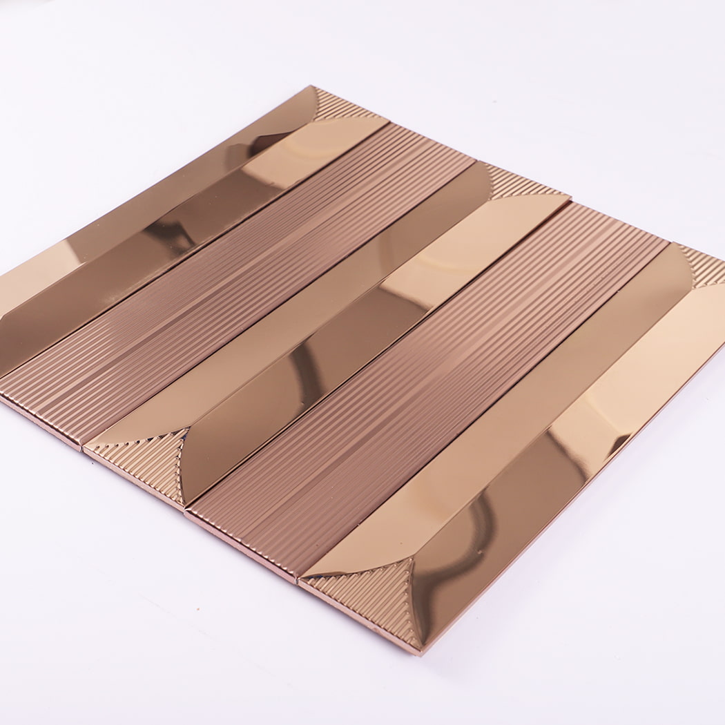 Angled view of a single rose gold mosaic tile sheet lying flat on a white surface.
