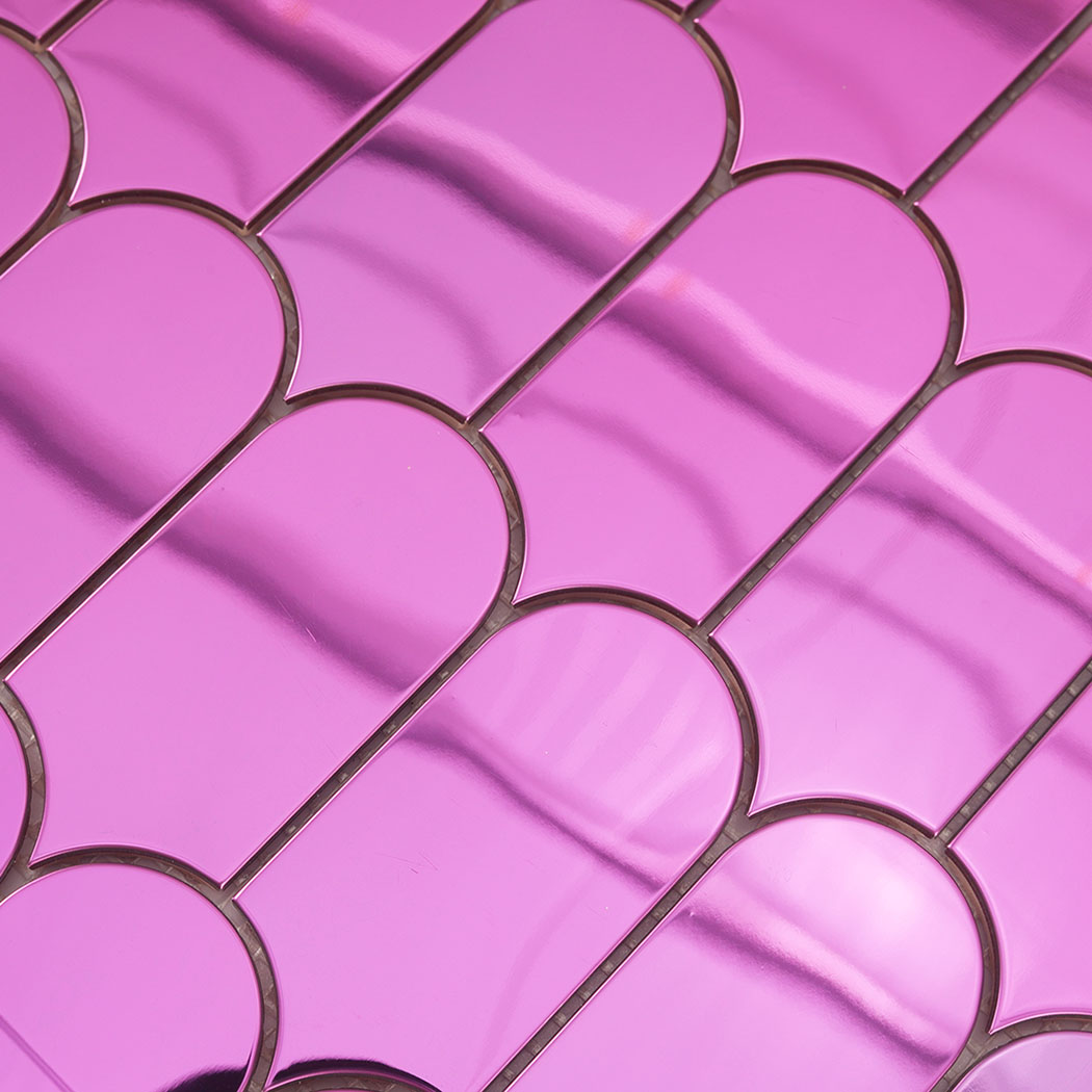 Pink arch metal mosaic close up showing curved joints and mirror reflections