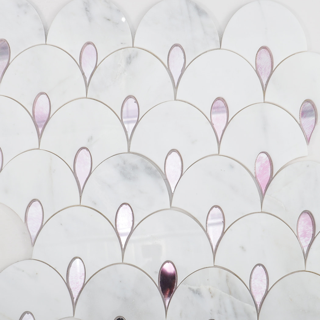 Full layout of white marble fan mosaic tiles with pink glass teardrop accents.