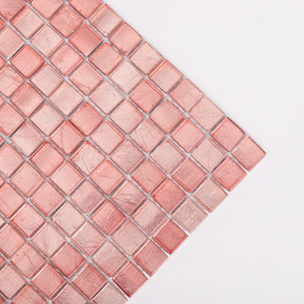 Close up of corner detail on pink glass mosaic tile sheet