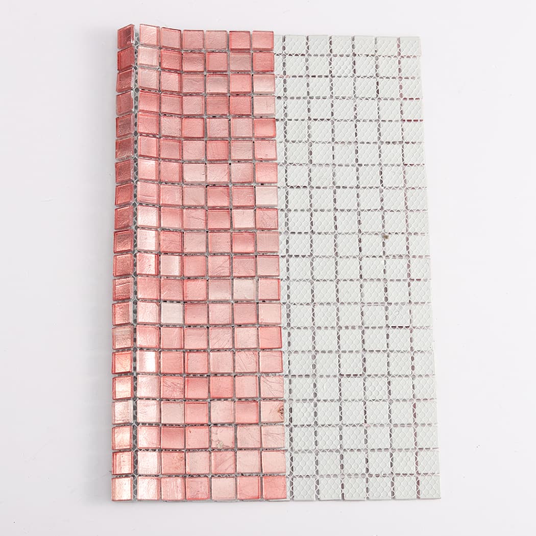 Front and back view of pink glass mosaic tile sheet with mesh backing