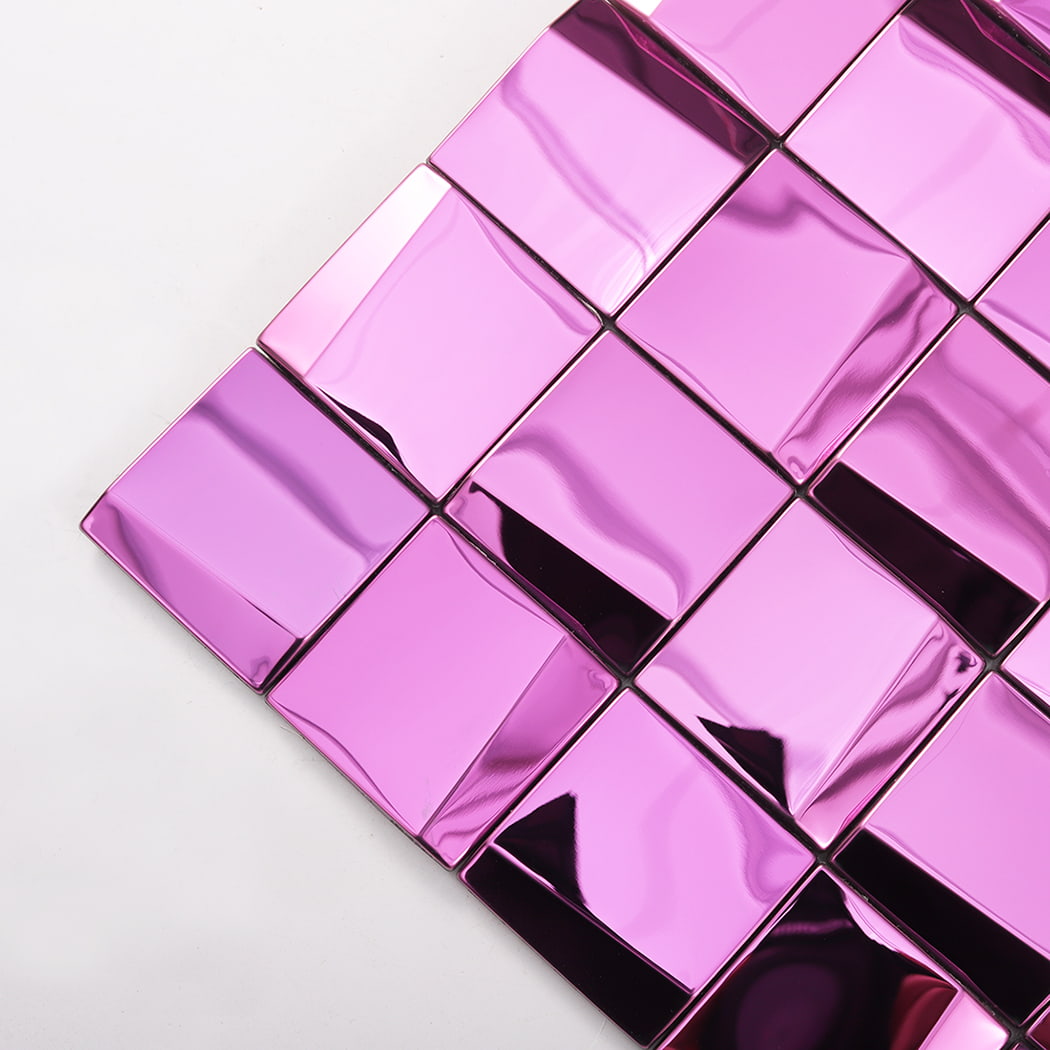 Angled close up of pink mirror metal mosaic tile surface