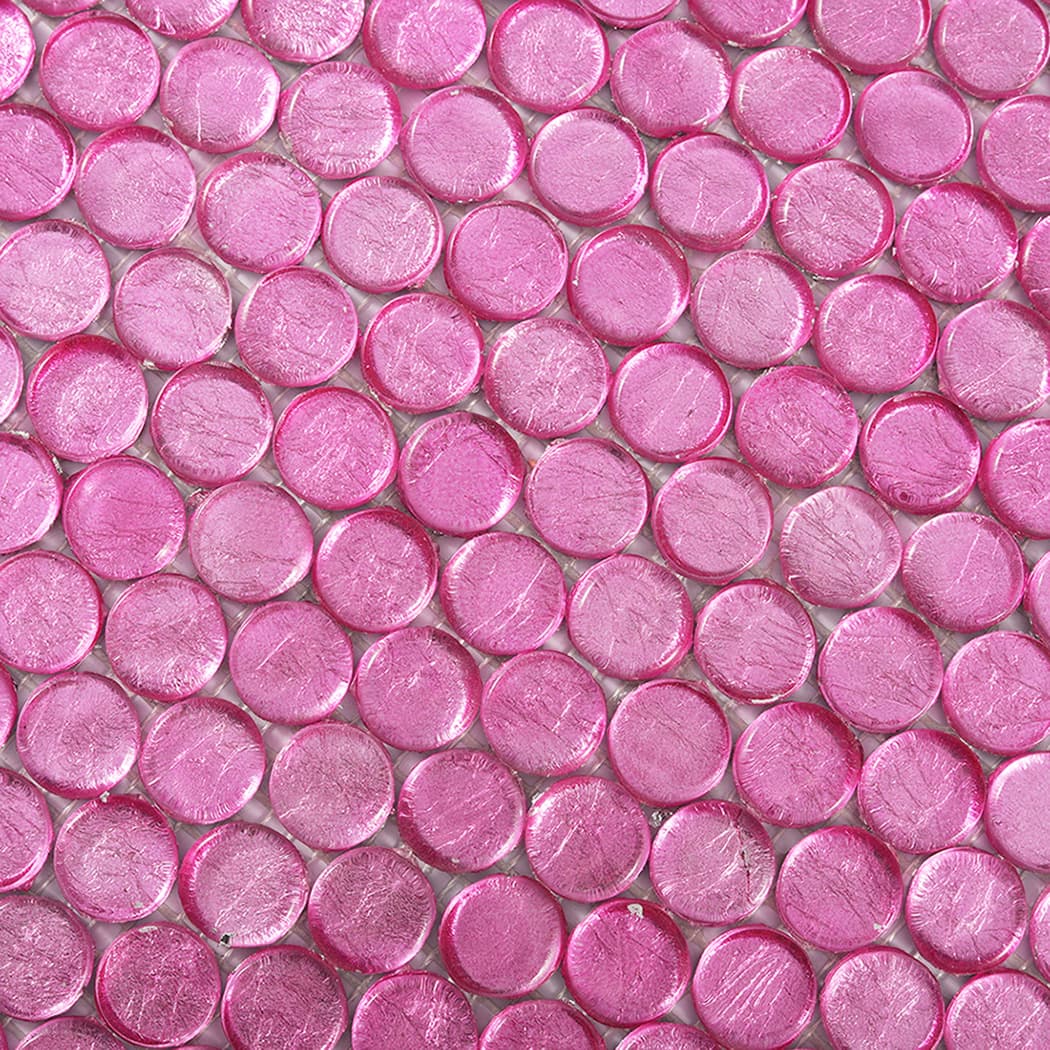 Detailed close-up of pink round glass mosaic tiles showing glossy texture