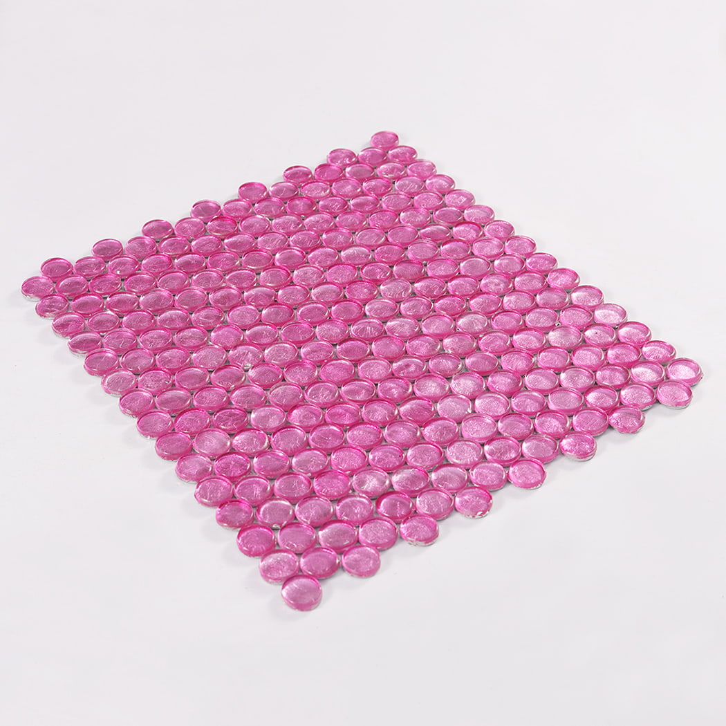 Perspective view of full pink round glass mosaic tile sheet on white surface