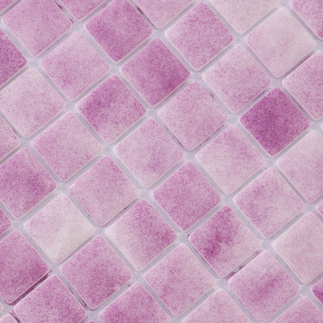 Close-up texture detail of purple recycled glass mosaic tiles.