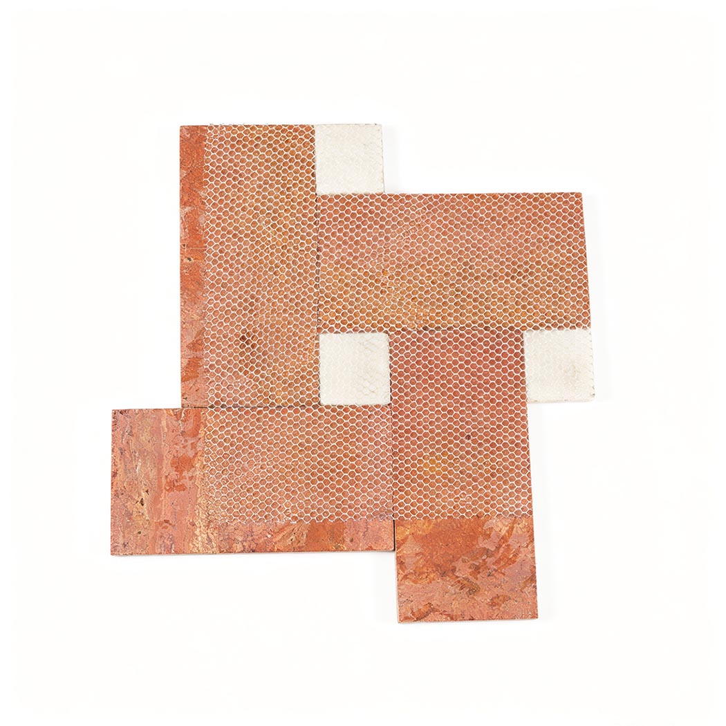 Mesh backing of red travertine geometric mosaic tile with white accents