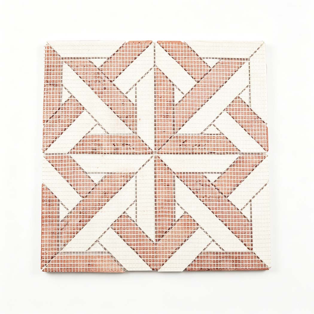 Mesh backing of red travertine and white marble geometric mosaic tile sheet