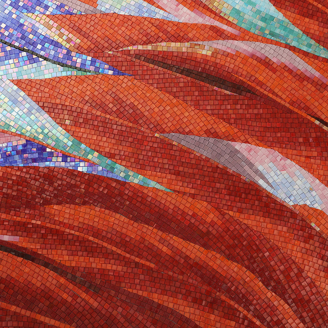 Red and orange handmade glass mosaic leaves with iridescent color accents