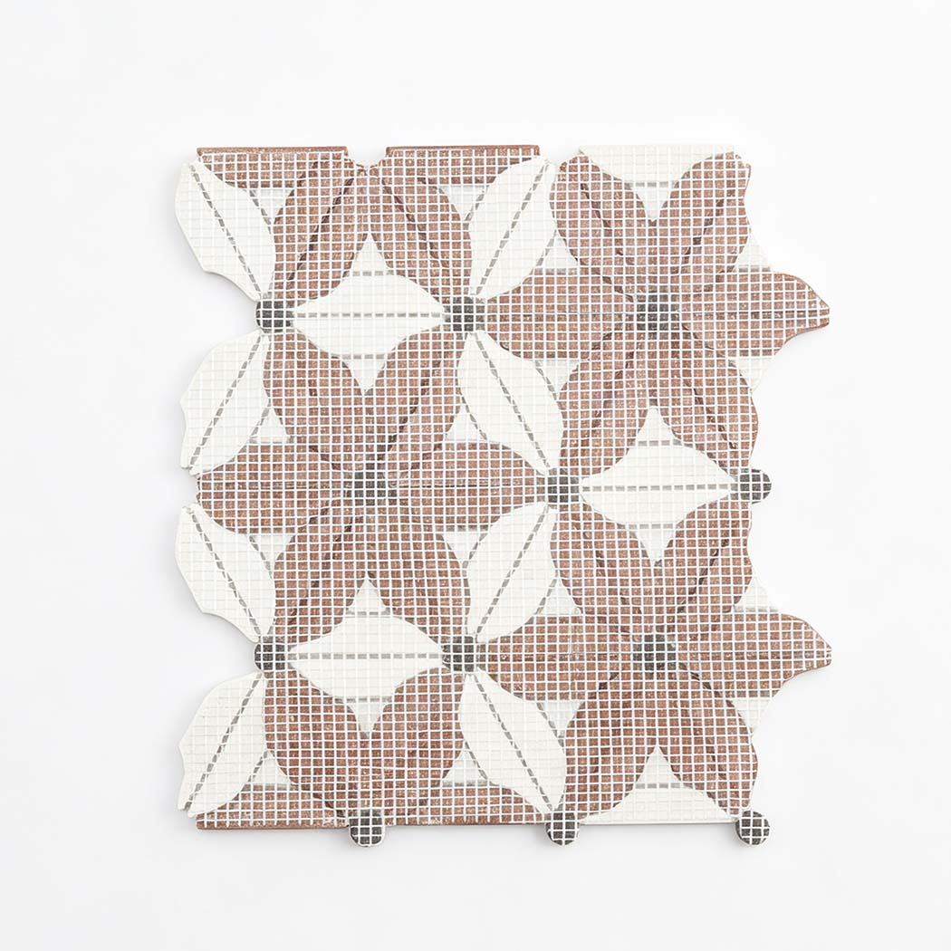 Mesh backing of red and white marble floral mosaic tile with black accents