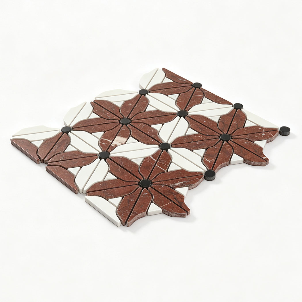 Red and white marble floral mosaic tile sample with repeating flower pattern