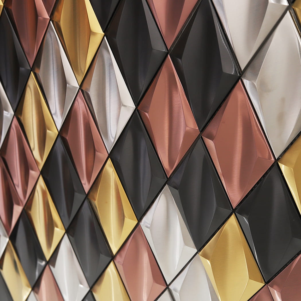 Close-up of light reflecting off the faceted surfaces of 3D diamond metal tiles.