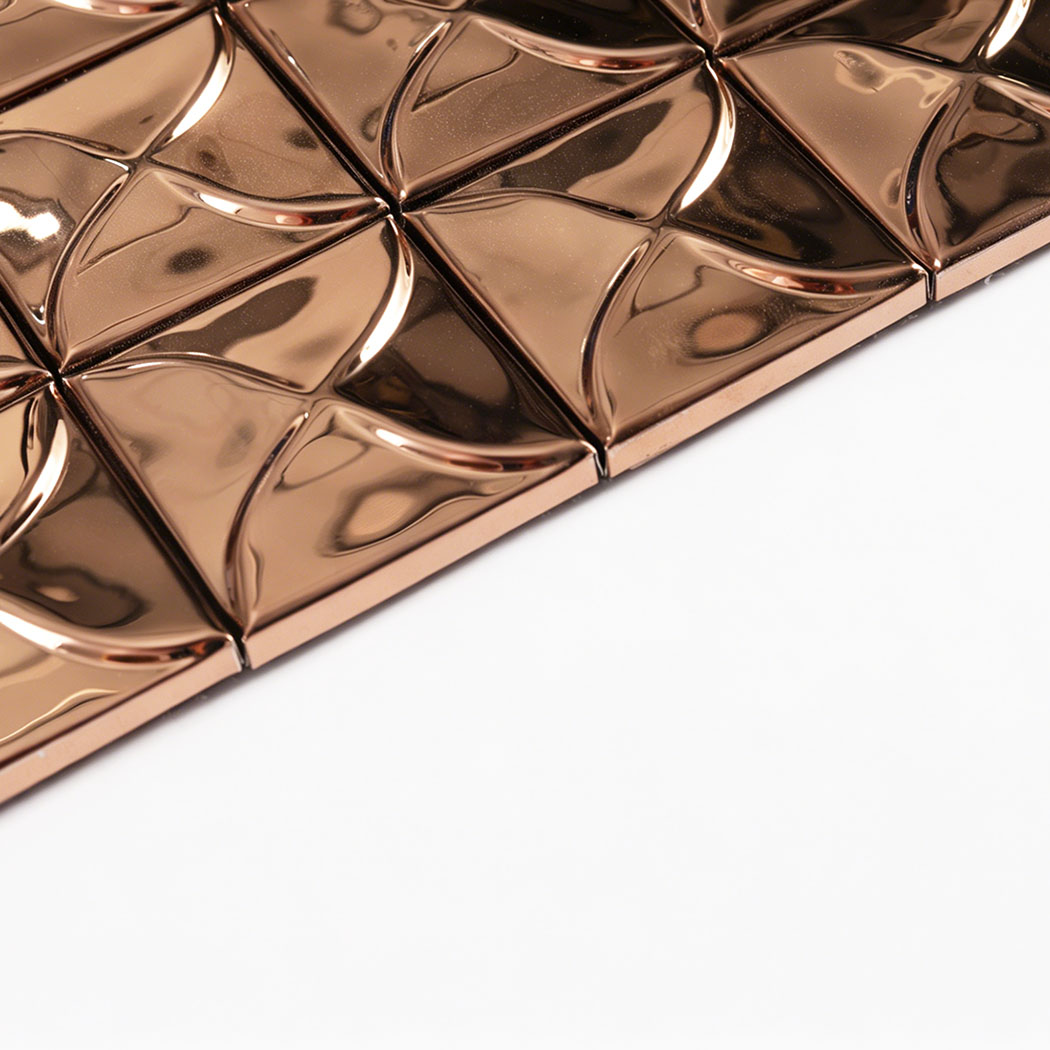 Side close up of rose gold 3D square mosaic tile showing thickness and raised surface