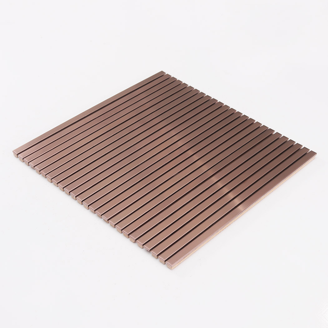 Angled view of rose gold brushed stainless steel ribbed tile sheet