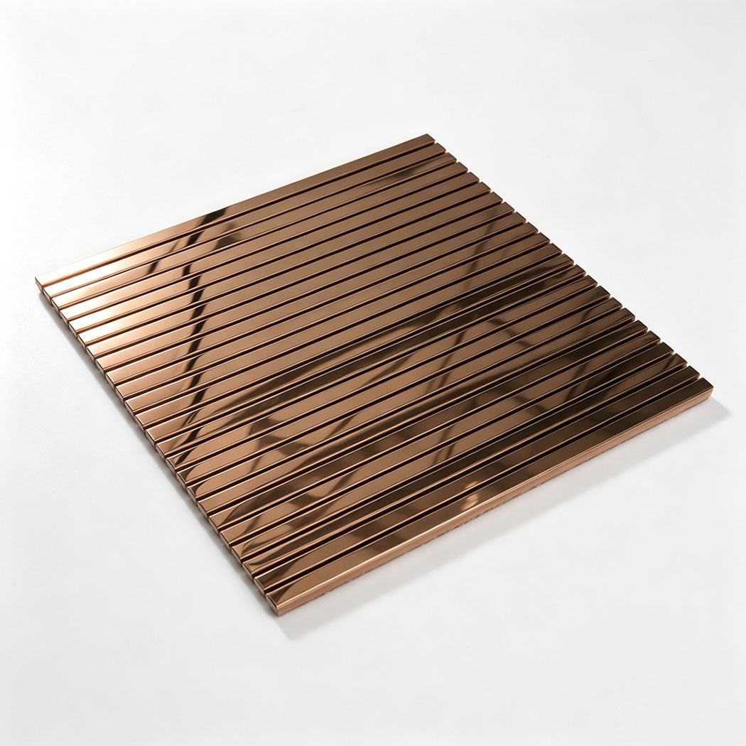 Angled view of rose gold mirror stainless steel linear tile sheet