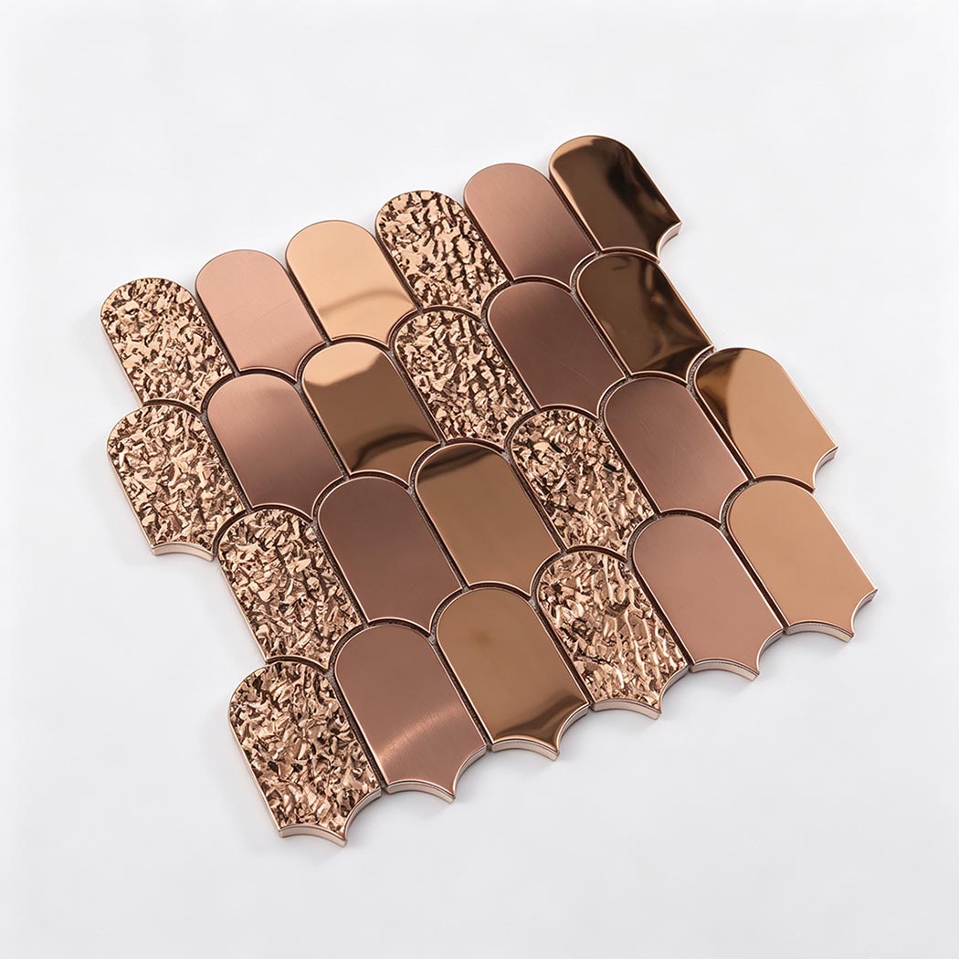 Angled view of rose gold mixed finish scallop metal mosaic tile sheet