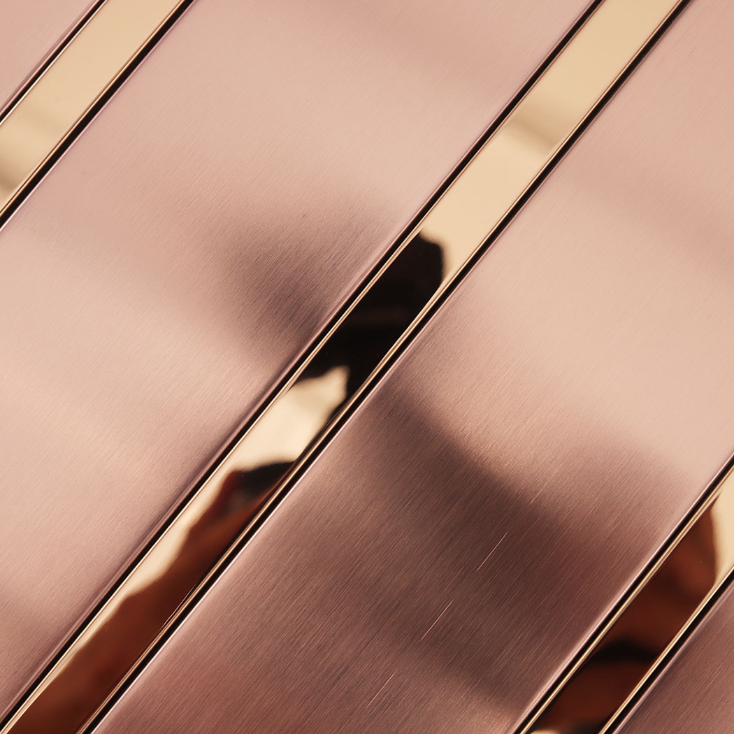 Close-up of brushed rose gold stainless steel striped tile