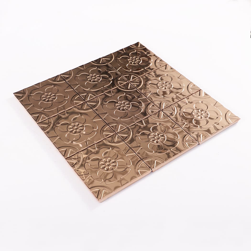3D angle shot of rose gold embossed metal tile sheet on clean white background