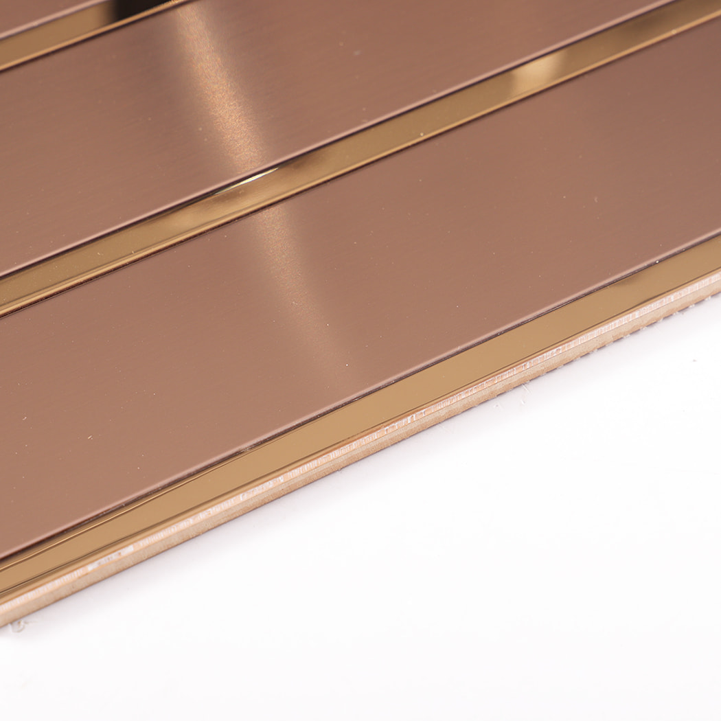 Close up of rose gold metal tile edge and layered structure
