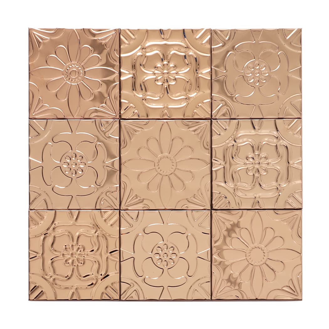 Front view of rose gold mixed floral embossed metal tile sheet with assorted flower designs