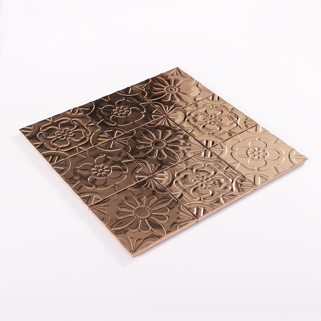 Perspective view of rose gold embossed metal tile sheet on white background
