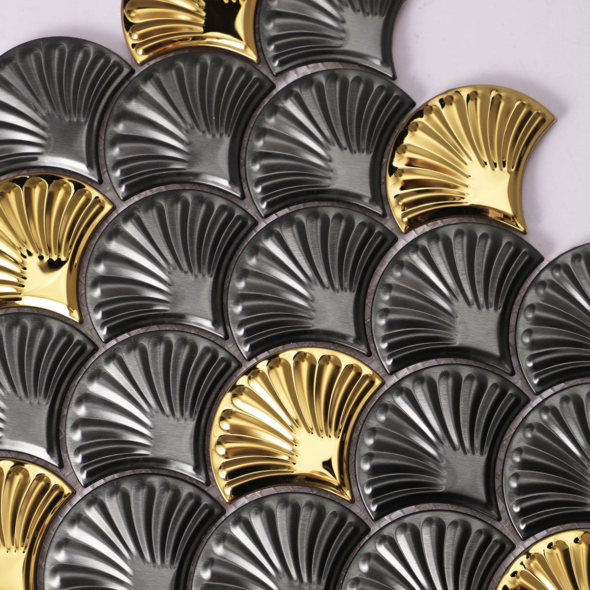 Shell-style metallic tiles with brushed finish