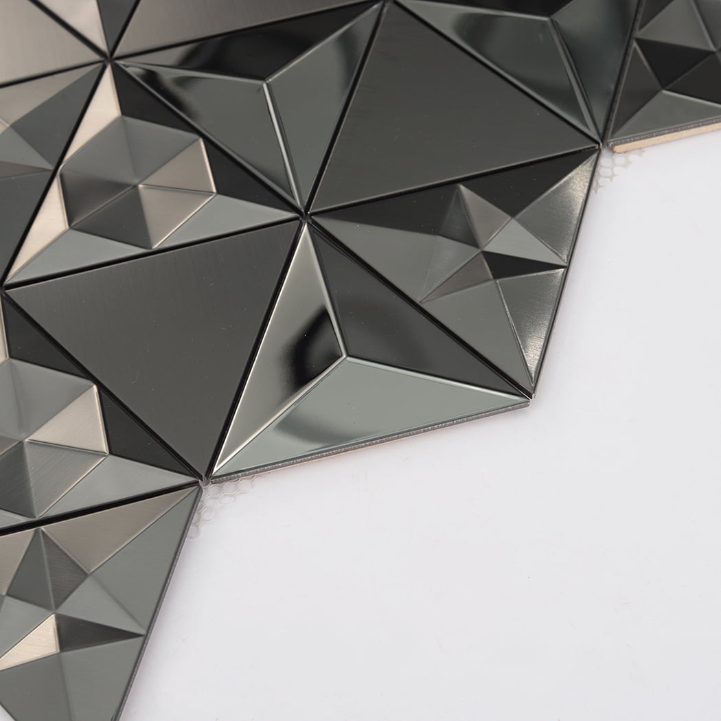 Side perspective of black 3D triangle mosaic tiles showing the raised 3D surface profile.