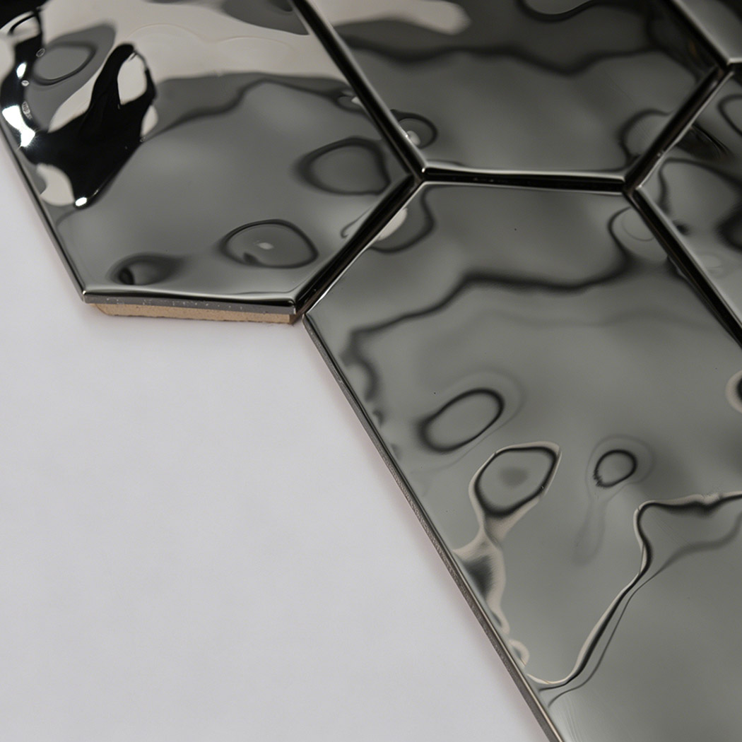 Side view of glossy black hexagon mosaic tile showing edge and thickness