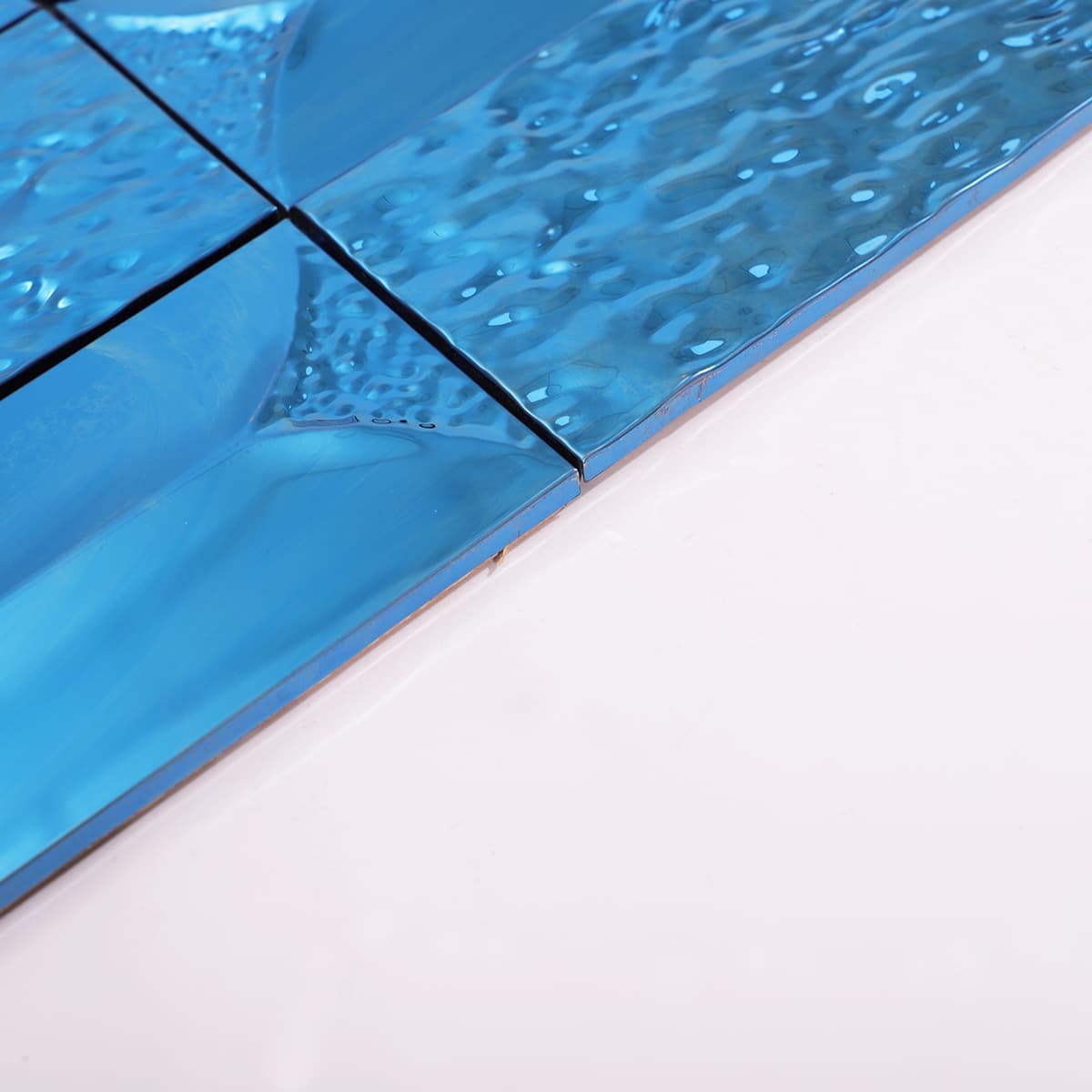 Side view displaying the raised structure and depth of the mosaic tiles