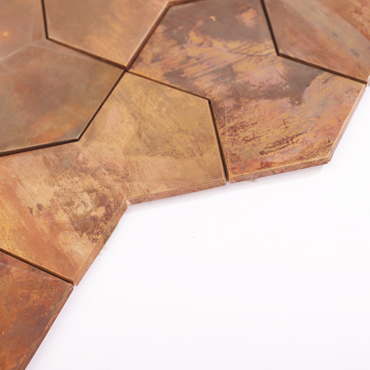 Side profile showing the depth and three-dimensional structure of the tiles.