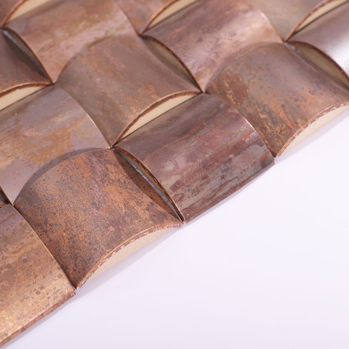 Side angle showing raised 3D shape and tile thickness