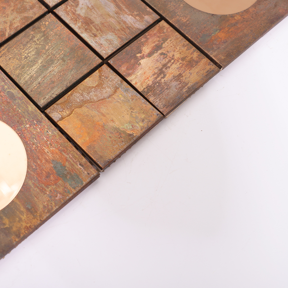 Side view showcasing the depth and layered design of the mosaic tiles.