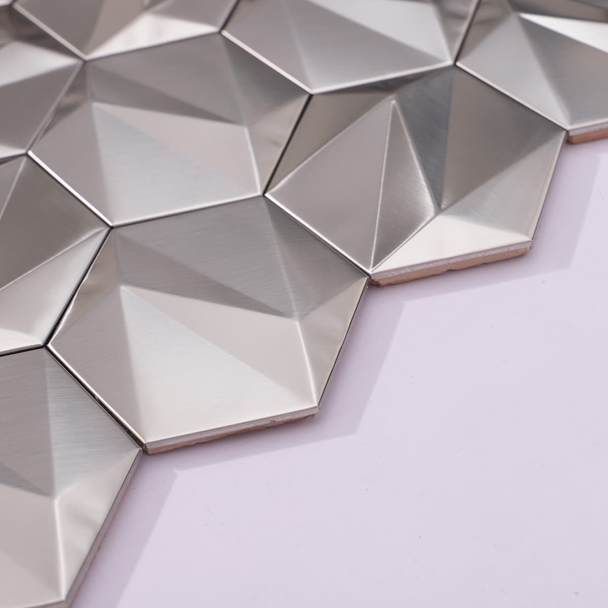 Side angle showing beveled 3D stainless surface