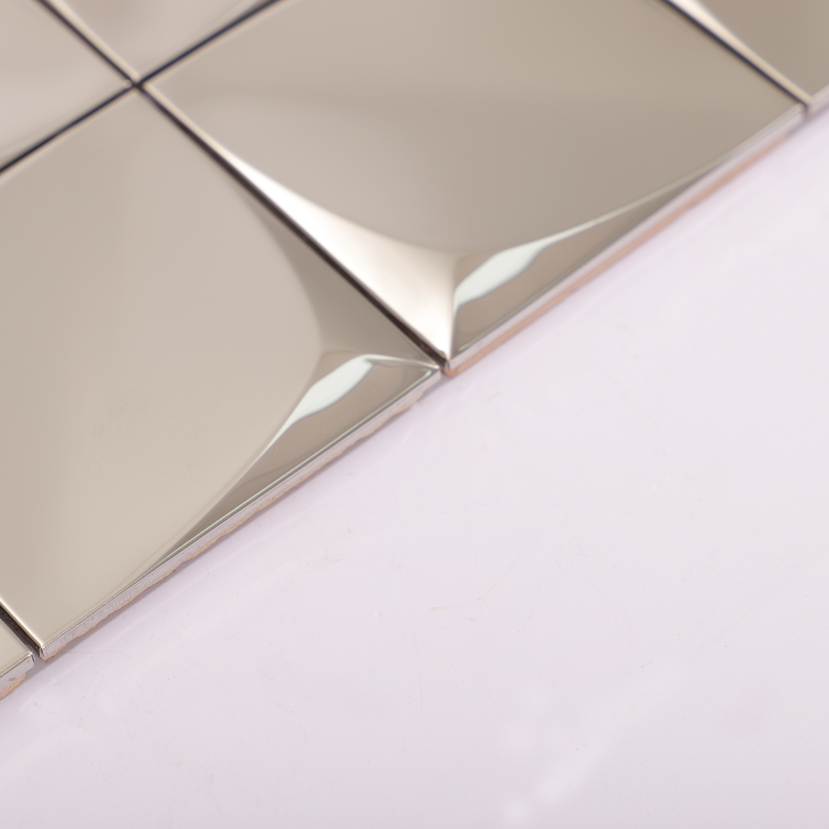 Side profile showcasing the depth of the 3D stainless steel tiles.