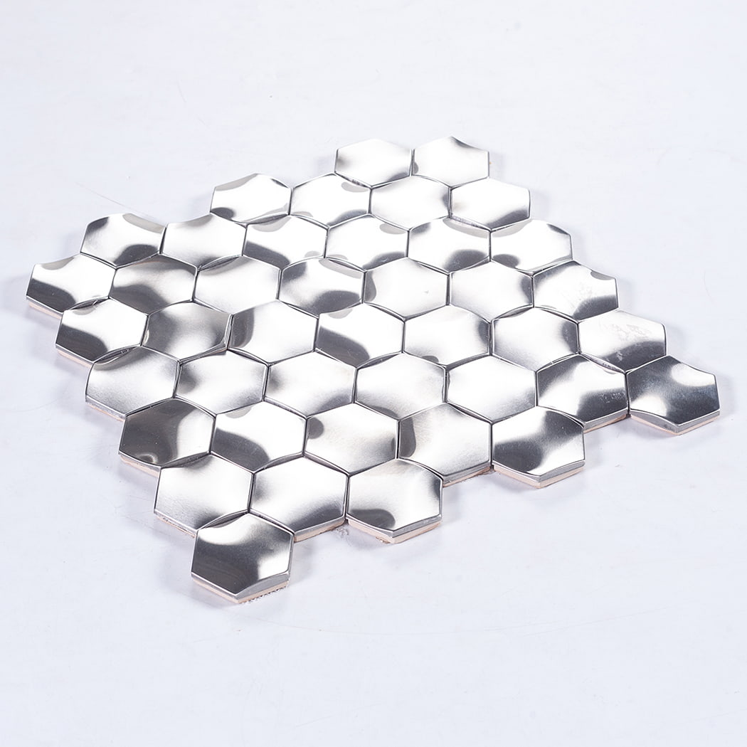 Side view close-up showing the thickness of silver 3D hexagonal mosaic tiles.