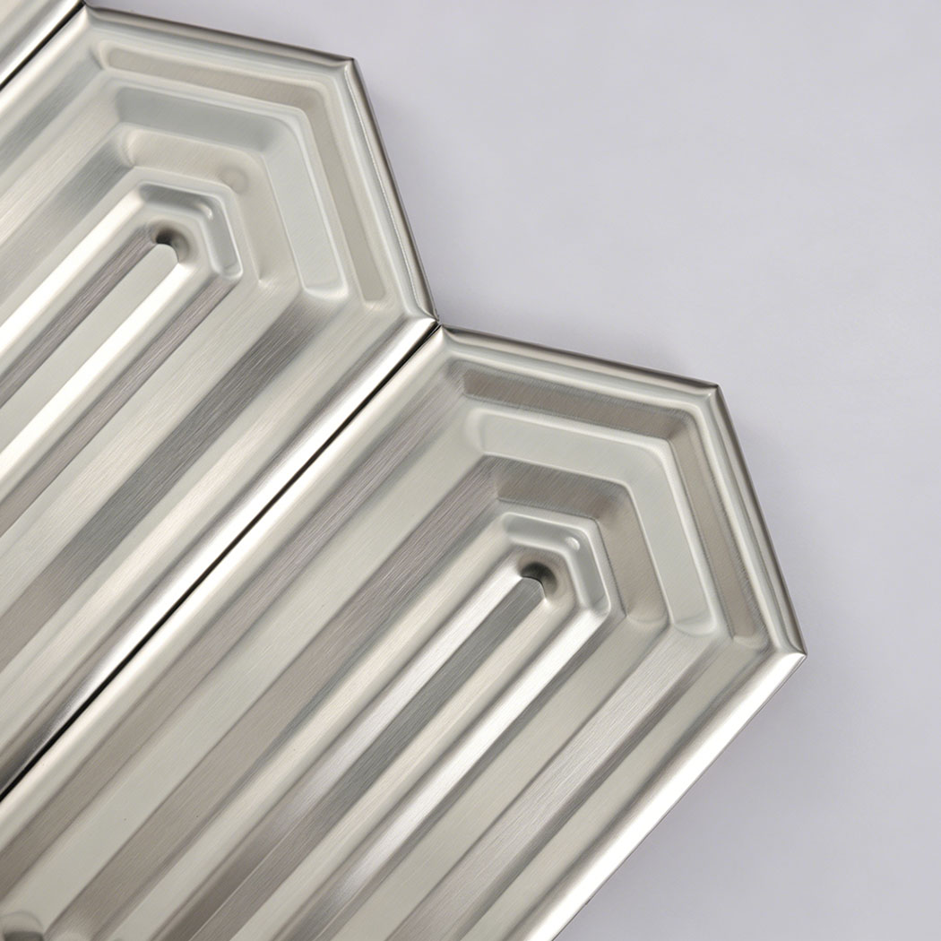 Close up detail of silver brushed hexagon mosaic metallic surface texture
