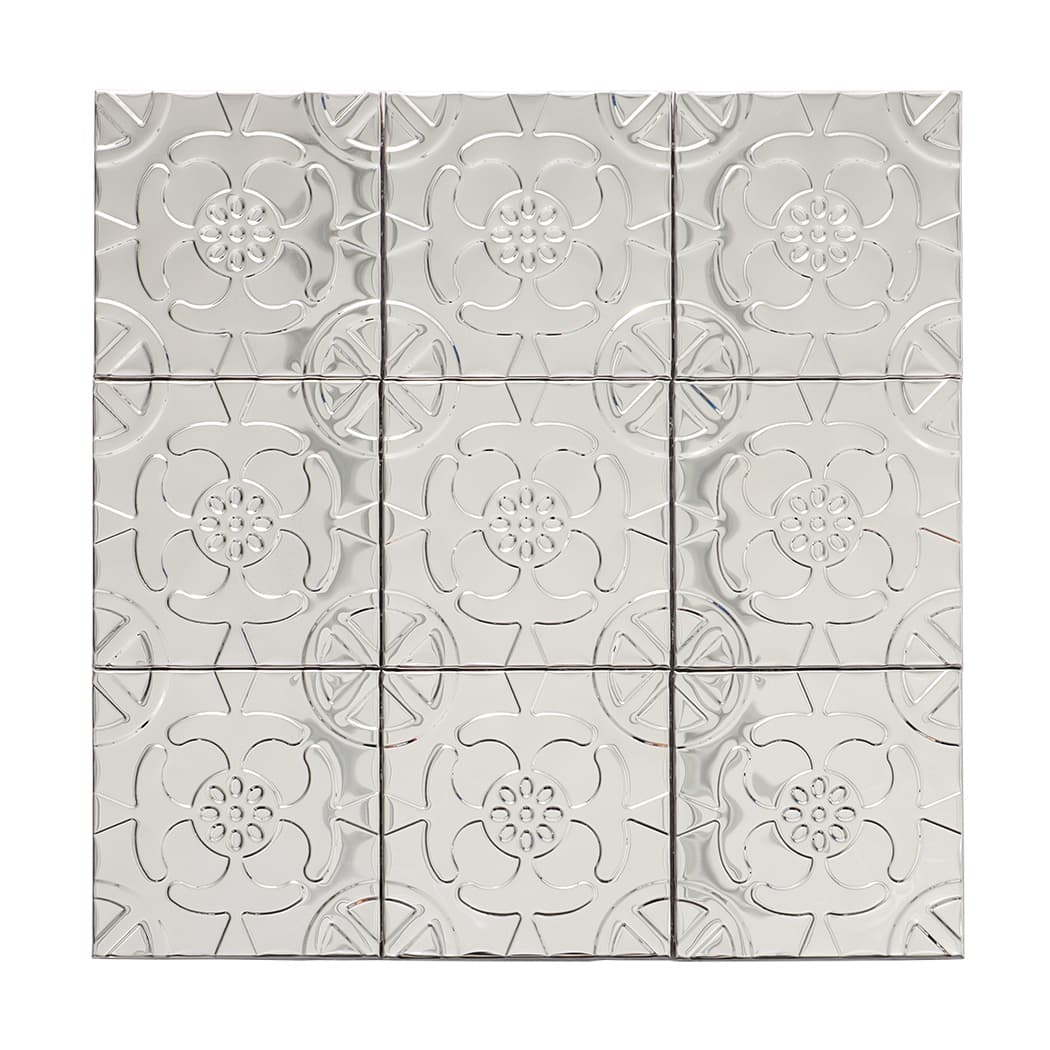 Front view of silver embossed flower mosaic tiles