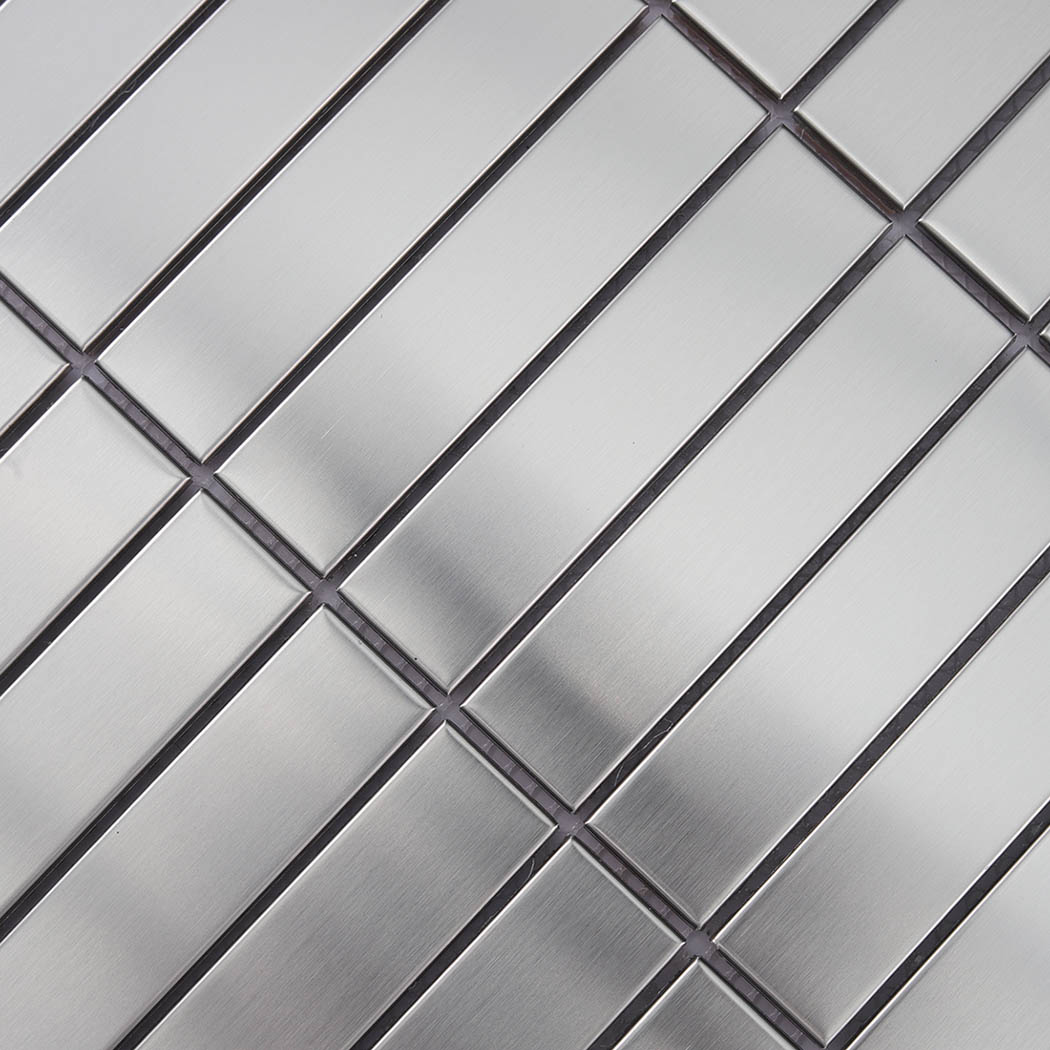 Detailed view of silver linear mosaic tile with dark grout gaps
