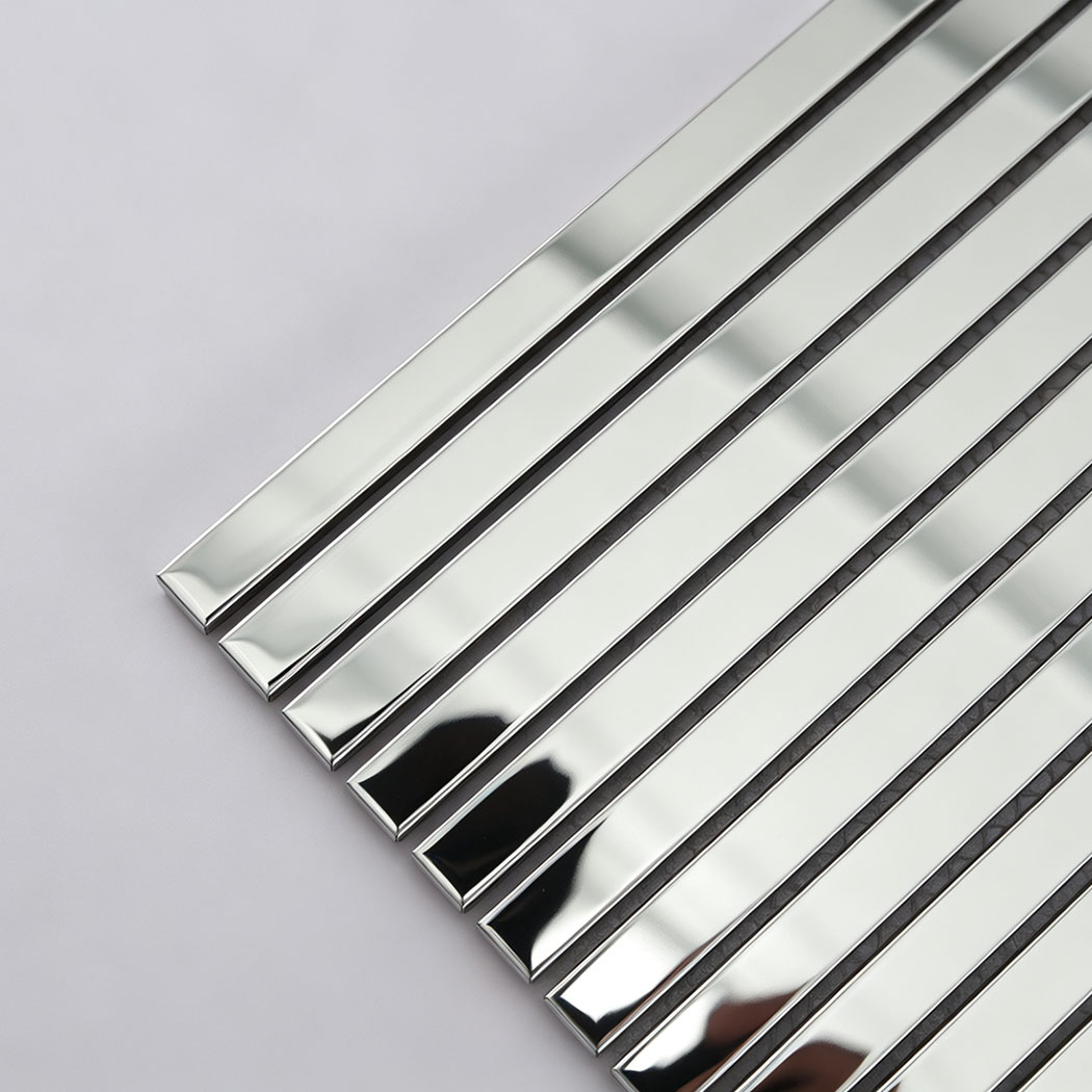 Corner close-up of silver stainless steel pencil tile