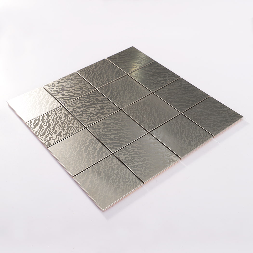 Angled view of silver brushed square stainless steel metal mosaic tile sheet 